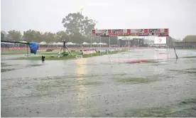  ?? Photograph: Joel Carrett/AAP ?? Water covers the running track as bad weather delays races during the 142nd running of the Stawell Gift at Central Park, Stawell, on Monday. Western Melbourne, central and eastern Victoria have been pummelled by storms overnight.