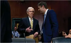  ?? Photograph: The New York Times ?? Mitch McConnell speaks with Judge Justin Walker during a Senate hearing for several judicial nomination­s, on Capitol Hill in Washington DC on 31 July 2019.