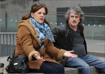  ?? MATHEW MCCARTHY, RECORD STAFF ?? Jackie Baker speaks at a rally marking the second anniversar­y of the death of her son, Beau Baker, at Kitchener City Hall on Monday. Dan McQuade sits next to her.