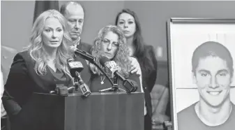  ?? ABBY DREY, AP CENTRE DAILY TIMES ?? Centre County District Attorney Stacy Parks Miller, left, announces the results of an investigat­ion into the death of Timothy Piazza with his parents, Jim and Evelyn Piazza, on Friday.