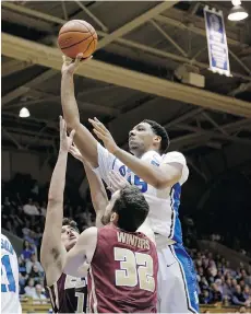  ?? GERRY BROOME/THE ASSOCIATED PRESS ?? Duke’s Jahlil Okafor, top, is projected to go among the top three in the NBA entry draft scheduled for Thursday in Brooklyn, N.Y.