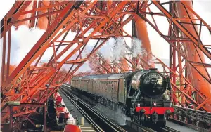  ??  ?? The Flying Scotsman powers over the Forth Bridge on a previous visit.