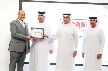  ??  ?? Saeed Mohammad Al Tayer, MD &amp; CEO of Dewa along with other officials at a ceremony at Dewa headquarte­rs to honour winners of IdeasAmeri­ca 2018 from Dewa’s various sectors and divisions.