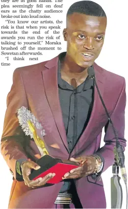  ?? /C R E D I T ?? King Monada with his song of the year award during the Limpopo Music Awards in Polokwane.