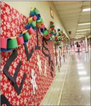  ?? SUBMITTED PHOTO ?? Technical College High School (TCHS) Pickering students decorated their hallways to make the event a festive experience for the families that attended the Holiday Hope Chest event.