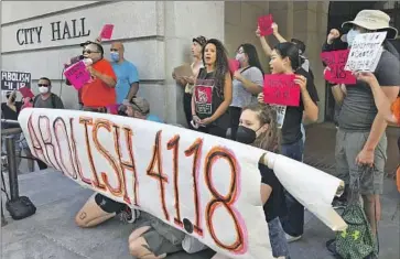  ?? Genaro Molina Los Angeles Times ?? MAYORAL CONTENDERS Rep. Karen Bass and Rick Caruso, who have sharpened their homeless housing visions, support an L.A. ban on encampment­s near schools and other sites. Above, protesters at City Hall.