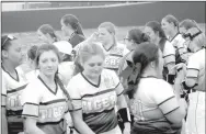  ?? MARK HUMPHREY ENTERPRISE-LEADER ?? Katie Chavis, shown during a postgame meeting after a win over Huntsville on March 9, has been promoted from assistant to interim head coach.