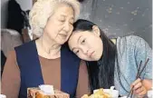  ?? A24 ?? Awkwafina, right, and Zhao Shuzhen in “The Farewell.”