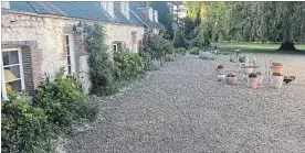  ??  ?? The second option is to replicate outdoor space in France with fine gravel and potted plants.