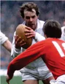  ?? SHUTTERSTO­CK ?? Seeing red: Sir Clive takes on Wales back in 1984