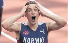  ?? AFP ?? Norway’s Karsten Warholm reacts after winning and breaking the world record in the men’s 400m hurdles final during the Tokyo 2020 Olympic Games in August 2021.