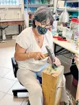  ?? ?? it yourself: Fiona Duncan creates a mosaic in one of Ravenna’s many workshops