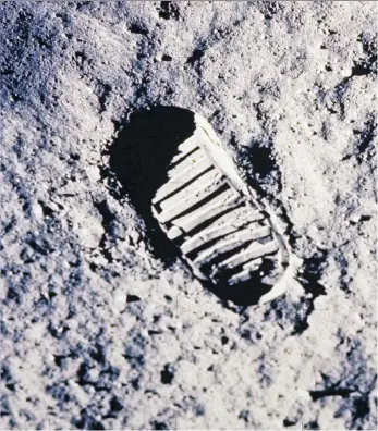  ?? NASA ?? No one born after 1969 has ever seen the moon without Neil Armstrong’s and Buzz Aldrin’s footprints on it, writes Chris Knight, who came close to meeting Armstrong in 2003.