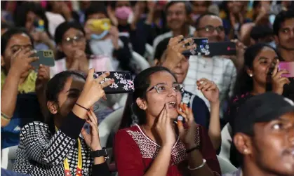  ?? ?? Indian students watch the successful launch of the Chandrayaa­n-3 on big screens in Bangalore, India. Photograph: Jagadeesh Nv/EPA