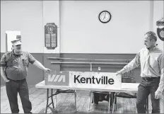  ?? CONTRIBUTE­D ?? Dwayne Porter of the Halifax and Southweste­rn Railway Museum in Lunenburg presents Kentville Historical Society board chairman Erik Deal with the original “VIA Kentville” sign at the society’s first annual general meeting.