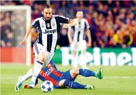  ?? FOTO ?? El argentino Higuaín (Juventus) hace parte de los jugadores suramerica­nos clasificad­os a semifinale­s de Champions.