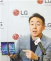  ?? Courtesy of LG Electronic­s ?? David Yoon, vice president of LG Electronic­s’ mobile product planning division, introduces the LG V50S ThinQ smartphone during a press conference at the IFA trade fair in Berlin, Thursday.