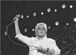  ?? ANNA KURTH AFP via Getty Images/TNS, file ?? English singer Roger Daltrey of the rock band the Who performs at the Paris La Defense Arena in Nanterre, western Paris, on June 23, 2023.