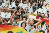  ??  ?? 台灣成為亞洲第一個以­法律保障同性婚姻的地­區。