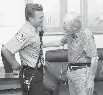  ?? OCFR ?? A new OCFR firefighte­r received a sweet surprise from his firefighte­r family with an unexpected pinning ceremony from his father.