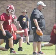  ?? PDN photo by Tom Firme ?? New Spiro football coach Kyle Fowler during spring football practice on Thursday.