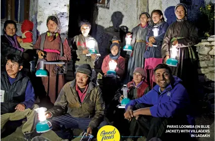  ??  ?? PARAS LOOMBA (IN BLUE JACKET) WITH VILLAGERS IN LADAKH