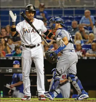  ?? DAVID SANTIAGO / MIAMI HERALD ?? Marlins second baseman Starlin Castro strikes out to end the third inning Thursday against the Dodgers at Marlins Park. The Marlins took two of three in the series.