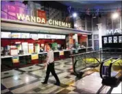  ?? ADAM DEAN/THE NEW YORK TIMES ?? A customer inside a Wanda Cinema theatre in Beijing, on May, 24, 2012. The Motion Picture Associatio­n of America said ticket sales of US movies in China saw no growth in 2016.