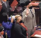  ?? AMADOR / THE TENNESSEAN STEPHANIE ?? Newly elected Rep. Torrey C. Harris, D-memphis, is sworn in with the members of House during the start of the 112th Tennessee General Assembly in Nashville on Jan. 12. Harris says Tennessee has enough money to invest more in education.