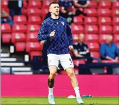  ?? AFP ?? Croatia’s forward Ivan Perisic warms up ahead of the UEFA EURO 2020 Group D football match against Scotland at Hampden Park in Glasgow on June 22.