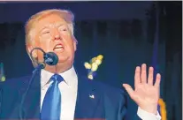  ?? GERALD HERBERT/ASSOCIATED PRESS ?? Republican presidenti­al candidate Donald Trump speaks at a campaign rally in Manchester, N.H., on Thursday.