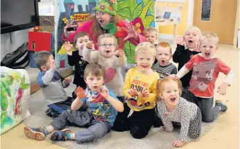  ??  ?? Visit Children’s author Jo Hall with children at Cornton Primary