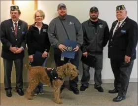  ?? TAWANA ROBERTS — THE NEWS-HERALD ?? American Legion 9th District Commander William Dittebrand and 1st Vice Commander William Keller recognized Veteran Service Officers Gini Geffert, Bill Hinde and Michael Hatton at the Lake County Veterans Service Commission in Painesvill­e on May 3.