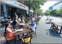  ?? Matthew Brown / Hearst Connecticu­t Media ?? Area restaurant­s begin to transform Bedford Street into outdoor Streaterie­s on May 30 in Stamford.