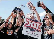  ?? [PHOTO BY SARAH PHIPPS, THE ?? Oklahoma State celebrates the Big 12 Baseball Tournament championsh­ip after beating Texas at Chickasaw Bricktown Ballpark last May.