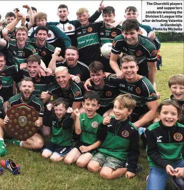  ?? Photo by Michelle Cooper Galvin ?? The Churchill players and supporters celebrate winning the Division 5 League title after defeating Valentia in Glenbeigh.