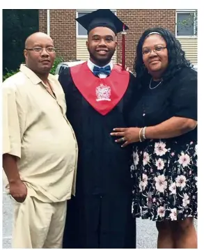  ?? — TNS ?? Orchard Quince High School graduation speaker Hakeem Howard, 18, with his mother, Courtney Howard, and father, Marcus Waugh.
