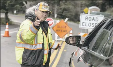  ?? BRIAN VAN DER BRUG — LOS ANGELES TIMES ?? Caltrans contractor Arleen Guzzie will be forever linked to the Big Sur area because of a large landslide contributi­ng to the closure of Highway 1. That part of the mountain near Mud Creek has been officially designated Arleen’s Slide.