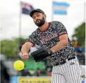  ?? WARWICK SMITH/STUFF ?? Josh Pettett pitches for New Zealand against Japan.