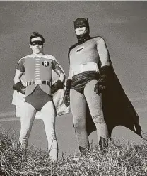  ?? FXM ?? Adam West, right, and Burt Ward reprise their campy TV roles for the 1966 film “Batman,” airing today on FXM.