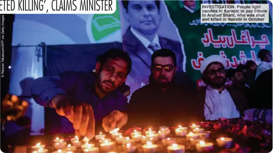  ?? ?? INVESTIGAT­ION: People light candles in Karachi to pay tribute to Arshad Sharif, who was shot and killed in Nairobi in October