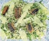  ?? [PHOTO BY MELISSA D’ARABIAN/AP] ?? This photo shows Brussels sprouts Caesar salad with sardine croutons. A fresh and healthy spin on a Caesar salad using Brussels sprouts instead of romaine, a little mayo instead of raw egg, sardines as croutons and no anchovy paste.