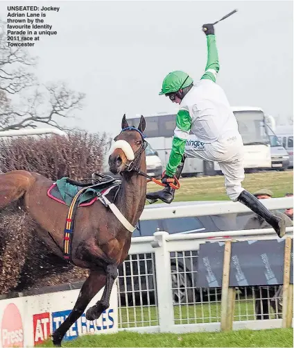  ?? Picture: JACKIE OLIVER/GEOFF ROBINSON PHOTOGRAPH­Y ?? UNSEATED: Jockey Adrian Lane is thrown by the favourite Identity Parade in a unique 2011 race at Towcester