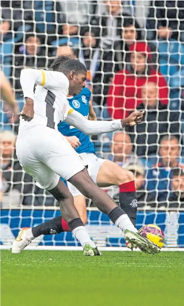  ?? ?? Joel Nouble fires the ball past Rangers’ Allan McGreor to give Livi an early lead