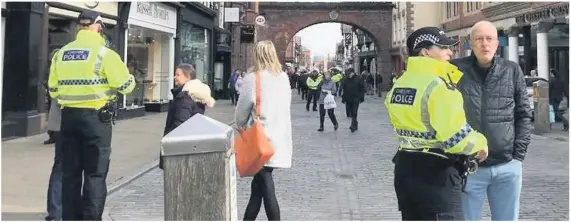  ??  ?? Officers taking part in Project Servator in Chester city centre