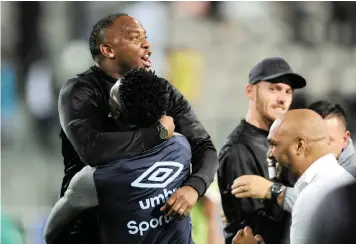  ?? RYAN WILKISKY BackpagePi­x ?? BENNI MCCARTHY celebrates after the league win over Sundowns in Athlone on Tuesday. |