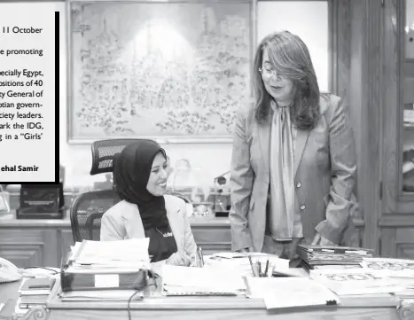  ??  ?? May Salah with the Minster of Social Solidarity, Ghada Wali in her office