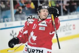  ?? CANADIAN PRESS FILE PHOTO ?? Canadian forward Andrew Ebbett celebrates after scoring a goal against HC Davos at the 91st Spengler Cup hockey tournament in Davos, Switzerlan­d, in December.