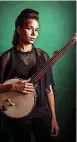  ?? [PHOTO PROVIDED BY DAVID MCCLISTER] ?? Singer-songwriter Rhiannon Giddens is the cofounder of the Grammy award-winning string band Carolina Chocolate Drops, in which she also plays banjo and fiddle.