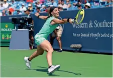  ?? Reuters ?? SHocKer: Kuznetsova returns a shot against Ashleigh barty during the wTA cincinnati masters semifinals match on Saturday. —